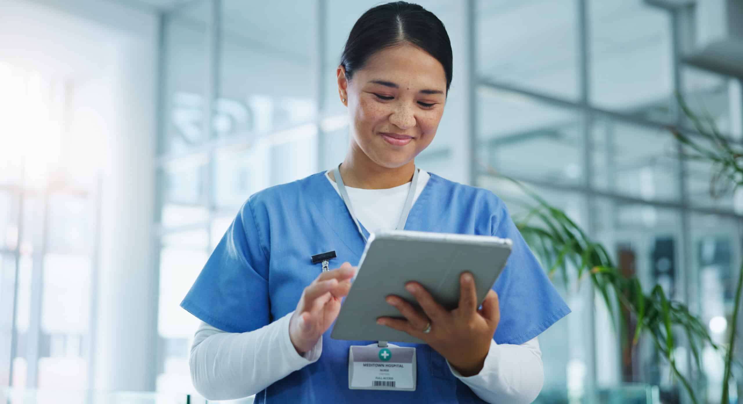 woman healthcare worker using digital tablet in ho 2026 03 25 05 28 16 utc scaled